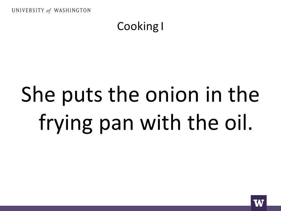 Cooking I She puts the onion in the frying pan with the oil.